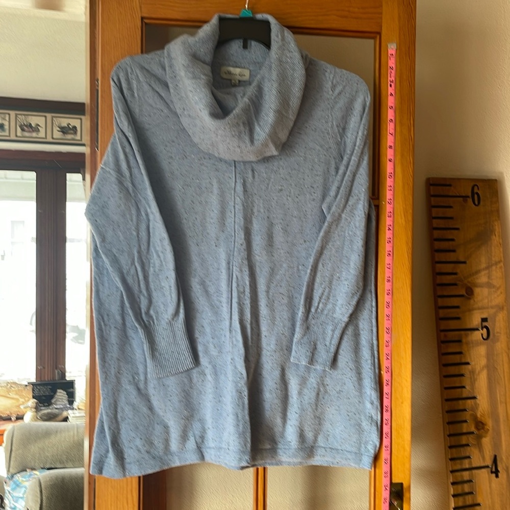 Light blue tunic sweater.